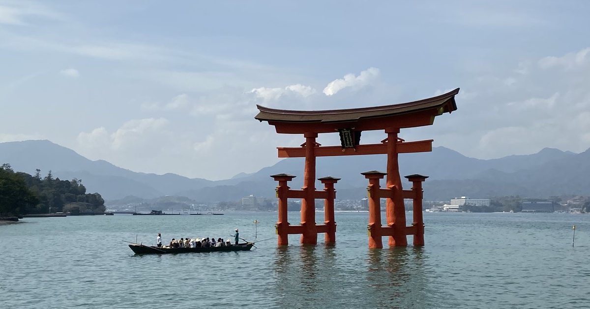 The great torii of Itsukushima Shrine rising from the sea at Miyajima